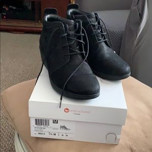 Black booties by Clark